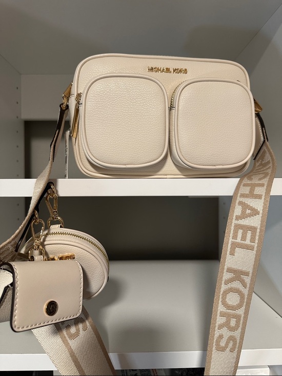 Michael Kors Handbags - Michael Kors Cream Pebble Leather Dual-Pocket Crossbody with Branded Strap